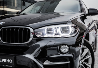 Подержанный автомобиль BMW X6 2017 года (2 фото)