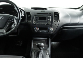 Подержанный автомобиль Kia Cerato Sedan 2013 года (14 фото)
