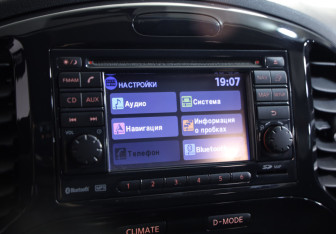 Подержанный автомобиль Nissan Juke 2012 года (13 фото)