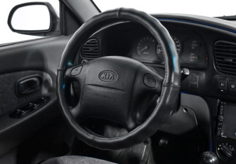 Подержанный автомобиль Kia Spectra Sedan 2007 года (15 фото)