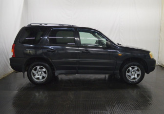 Подержанный автомобиль Mazda Tribute 2001 года (4 фото)