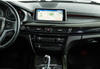 Подержанный автомобиль BMW X5 2015 года (14 фото)