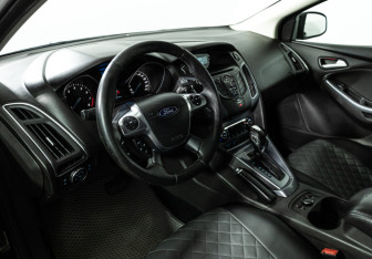 Подержанный автомобиль Ford Focus Hatchback 2014 года (11 фото)