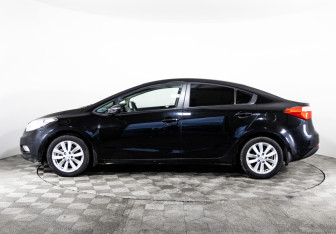 Подержанный автомобиль Kia Cerato Sedan 2013 года (8 фото)
