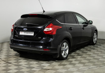 Подержанный автомобиль Ford Focus Hatchback 2014 года (5 фото)