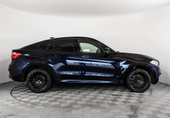 Подержанный автомобиль BMW X6 2015 года (5 фото)