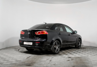 Подержанный автомобиль Mitsubishi Lancer Sedan 2009 года (5 фото)