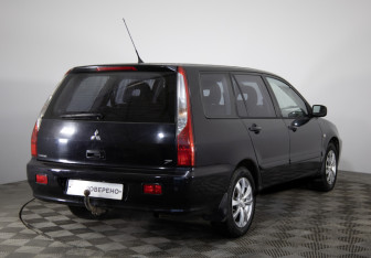Подержанный автомобиль Mitsubishi Lancer Wagon 2005 года (5 фото)
