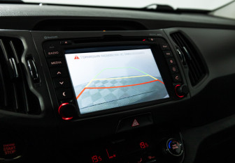 Подержанный автомобиль Kia Sportage 2012 года (15 фото)