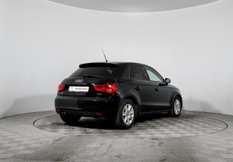 Подержанный автомобиль Audi A1 2014 года (5 фото)