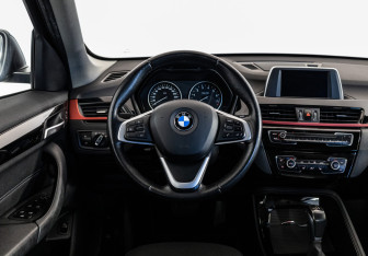 Подержанный автомобиль BMW X1 2017 года (14 фото)