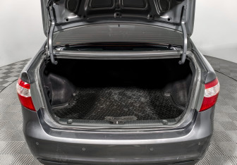 Подержанный автомобиль Kia Rio Sedan 2012 года (18 фото)