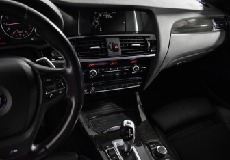 Подержанный автомобиль BMW X4 2015 года (19 фото)