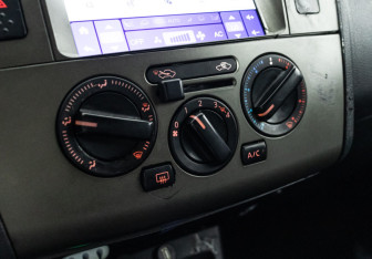 Подержанный автомобиль Nissan Tiida Sedan 2010 года (18 фото)