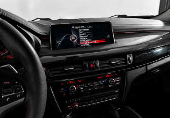 Подержанный автомобиль BMW X6 2015 года (13 фото)
