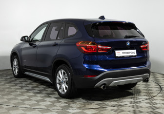 Подержанный автомобиль BMW X1 2015 года (7 фото)