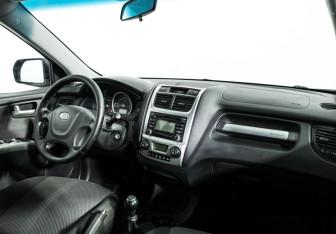 Подержанный автомобиль Kia Sportage 2010 года (9 фото)