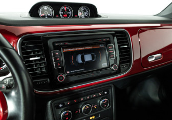 Подержанный автомобиль Volkswagen Beetle Hatchback 2013 года (15 фото)