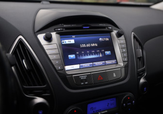 Подержанный автомобиль Hyundai ix35 2014 года (13 фото)