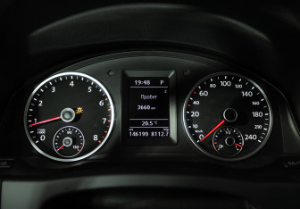 Подержанный автомобиль Volkswagen Tiguan 2013 года (12 фото)