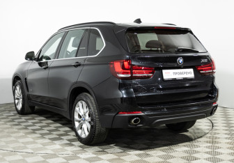 Подержанный автомобиль BMW X5 2015 года (7 фото)