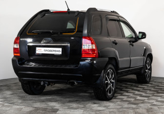Подержанный автомобиль Kia Sportage 2008 года (5 фото)