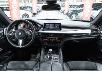 Подержанный автомобиль BMW X6 2016 года (20 фото)