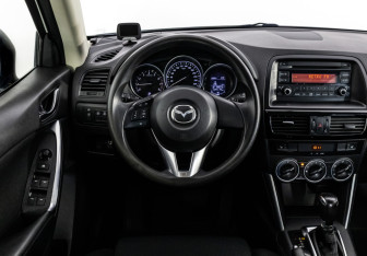 Подержанный автомобиль Mazda CX-5 2014 года (11 фото)