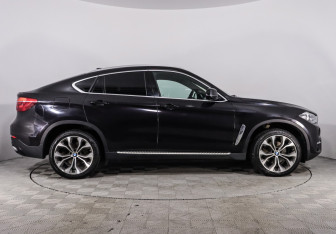 Подержанный автомобиль BMW X6 2016 года (8 фото)