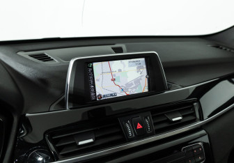 Подержанный автомобиль BMW X1 2015 года (17 фото)