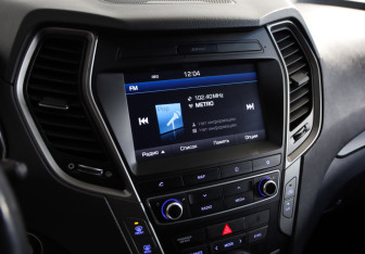 Подержанный автомобиль Hyundai Santa Fe 2015 года (14 фото)