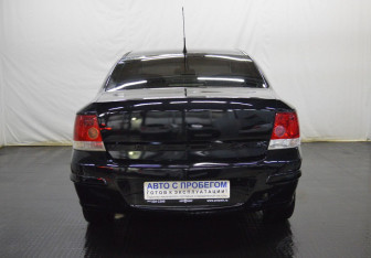 Подержанный автомобиль Opel Astra Sedan 2010 года (6 фото)