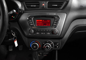 Подержанный автомобиль Kia Rio Sedan 2013 года (16 фото)