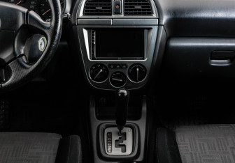 Подержанный автомобиль Subaru Impreza Wagon 2004 года (13 фото)