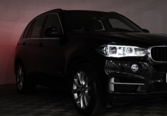 Подержанный автомобиль BMW X5 2015 года (26 фото)