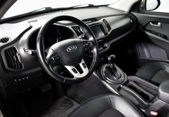 Подержанный автомобиль Kia Sportage 2013 года (9 фото)