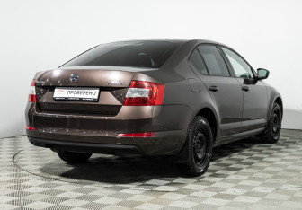Подержанный автомобиль Skoda Octavia Liftback 2014 года (5 фото)
