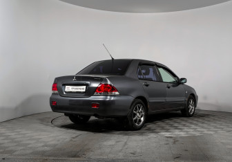 Подержанный автомобиль Mitsubishi Lancer Sedan 2006 года (5 фото)