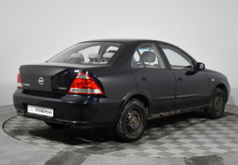 Подержанный автомобиль Nissan Almera Classic 2011 года (5 фото)