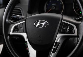 Подержанный автомобиль Hyundai Solaris Sedan 2012 года (12 фото)