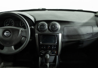 Подержанный автомобиль Nissan Almera Sedan 2014 года (14 фото)