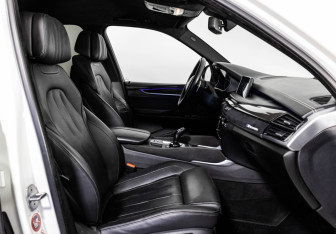 Подержанный автомобиль BMW X5 2015 года (27 фото)