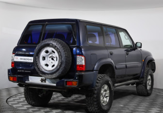 Подержанный автомобиль Nissan Patrol 2003 года (5 фото)