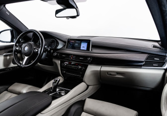 Подержанный автомобиль BMW X6 2018 года (11 фото)