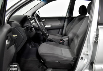 Подержанный автомобиль Kia Sportage 2009 года (10 фото)