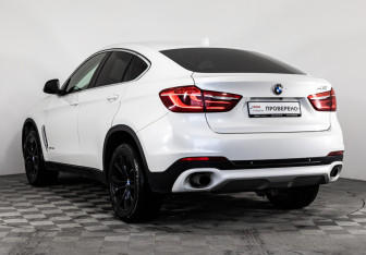 Подержанный автомобиль BMW X6 2015 года (7 фото)