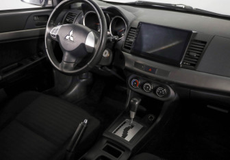 Подержанный автомобиль Mitsubishi Lancer Sedan 2012 года (9 фото)