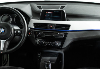 Подержанный автомобиль BMW X1 2018 года (14 фото)