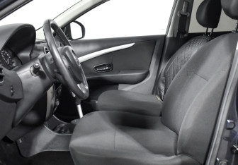 Подержанный автомобиль Nissan Almera Sedan 2013 года (10 фото)