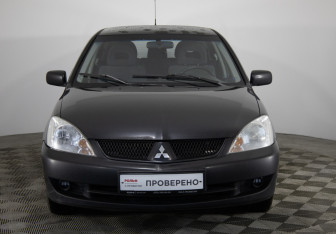 Подержанный автомобиль Mitsubishi Lancer Wagon 2005 года (2 фото)